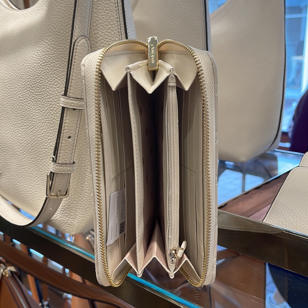 Kate Spade Carey Large Continential Wallet
Parchment - Picture 9 of 16